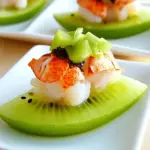 Kiwi Boat topped with Lobster and Scallion Mayonnaise Amuse Bouche